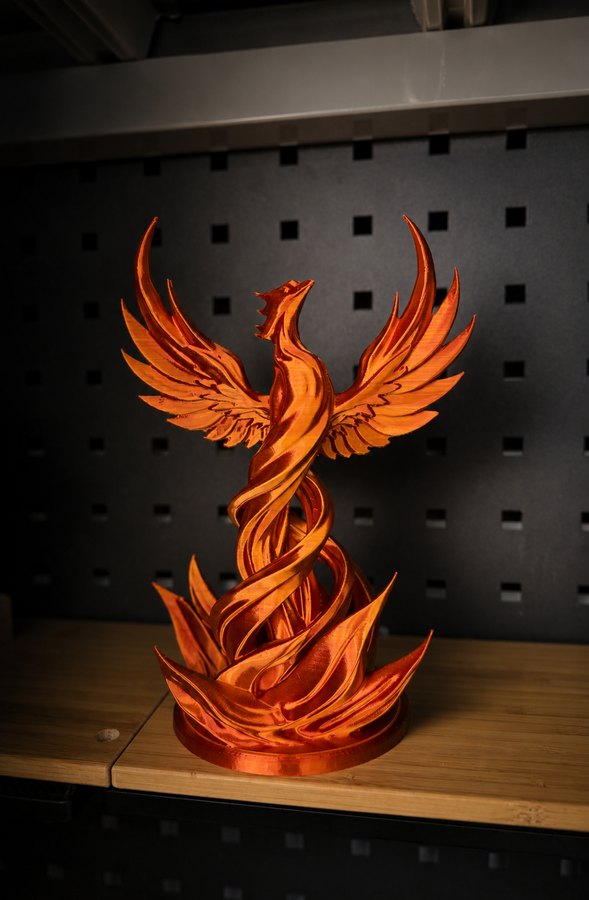 Orange silk PLA phoenix display sculpture